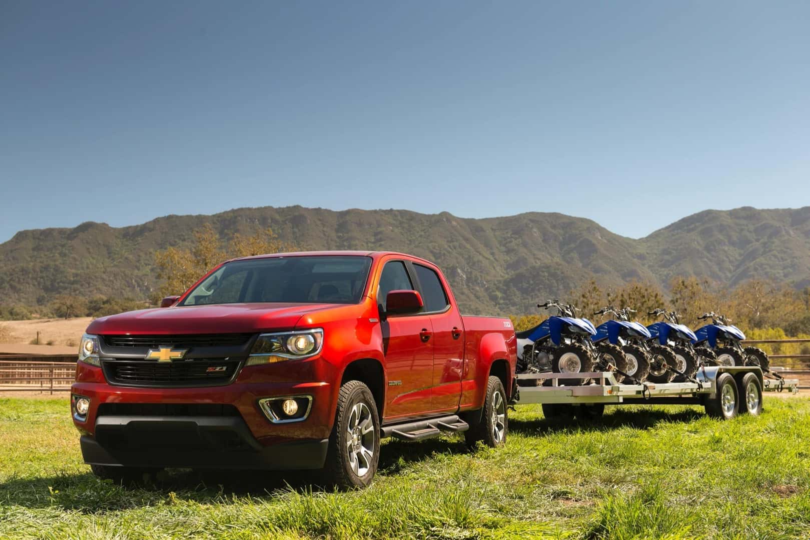 The Quality 2018 Chevrolet Colorado Diesel Towing Multiple Vehicles, In A Green Valley