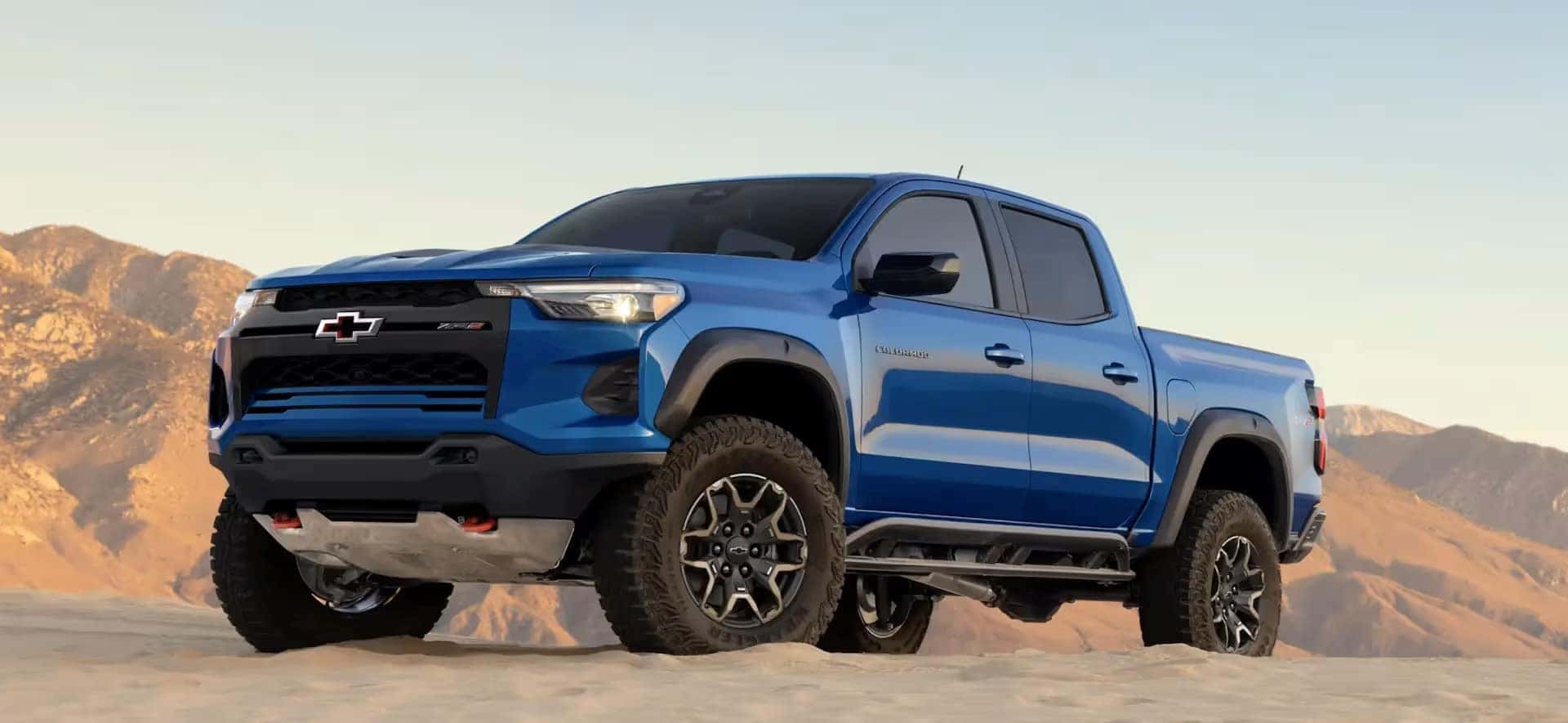 A Reef Blue Metallic 2026 Chevrolet Colorado ZR2, Parked Epically In The Mountains