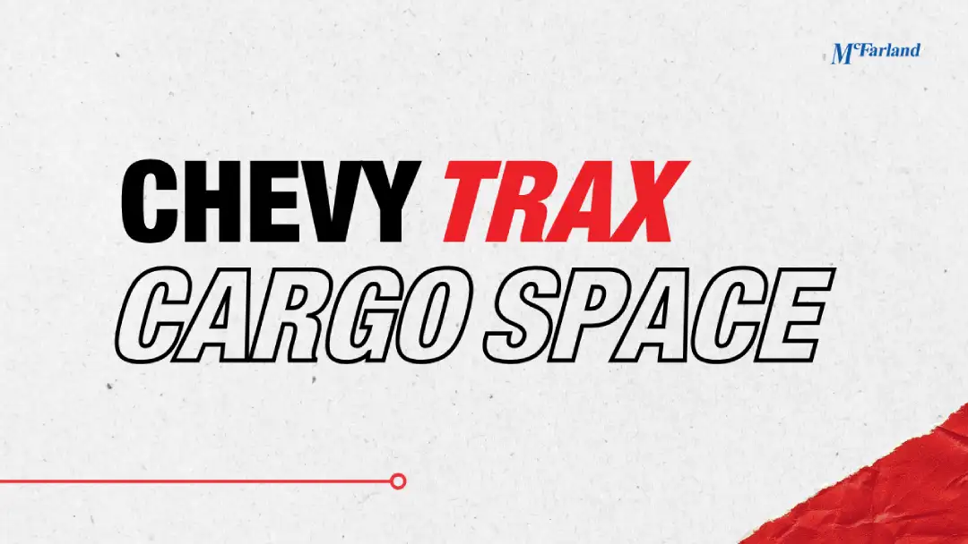 Open cargo area of a 2026 Chevy Trax loaded with groceries and gear