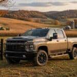 2026 Chevrolet Silverado 2500 HD on a rolling Mason County Kentucky farm field during fall harvest