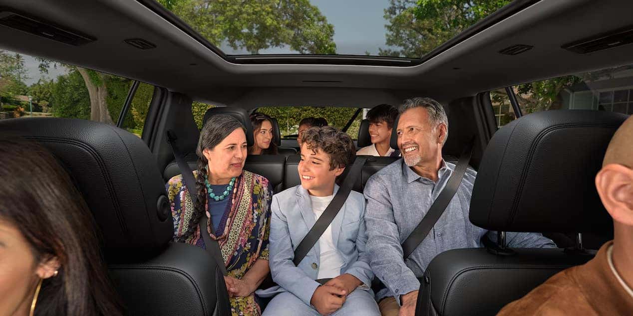 Family seated across all three rows of the 2026 Chevrolet Traverse