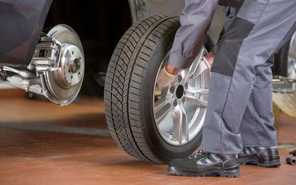 Mechanic Putting Tire