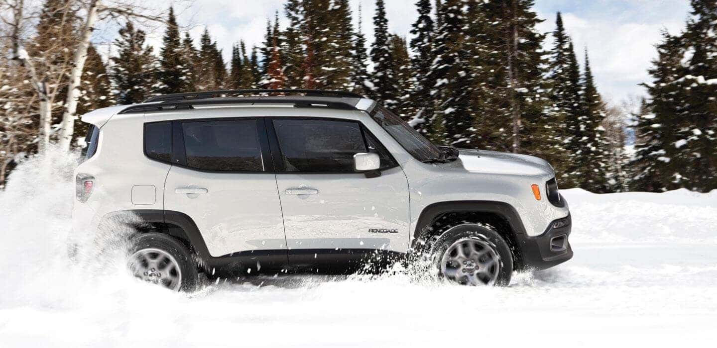 2017 Jeep Renegade driving through snow