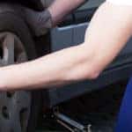 Mechanic changing car wheel