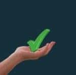 A hand holding a large green checkmark