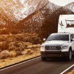 2019 RAM 1500 Towing Trailer in Mountains at Sunset