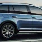 2019 Volkswagen Golf Alltrack driving down the road