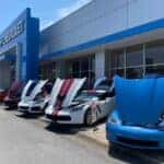 Cool Corvettes parked in front of the Preston Hood Chevrolet front doors
