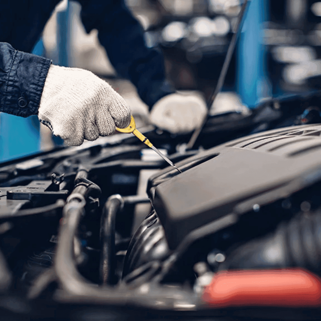 Hyundai Service Center Indianapolis - a hand holding an oil dipstick