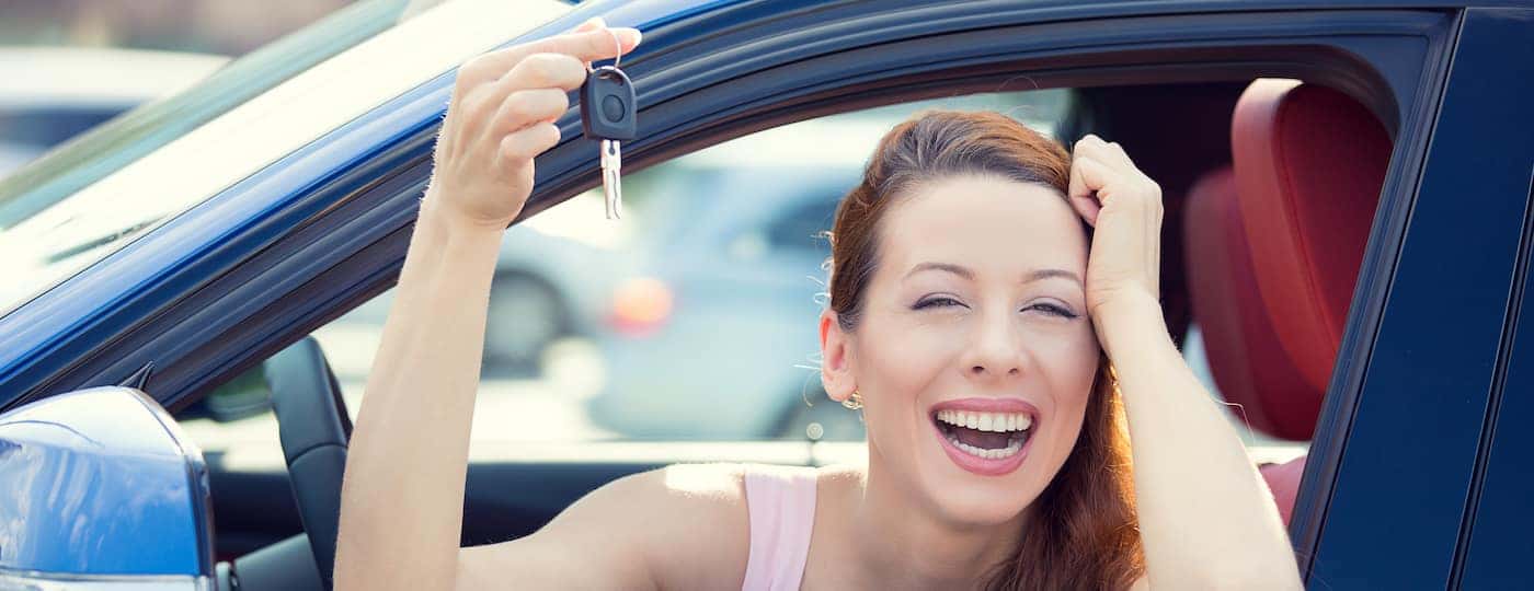 woman holding keys
