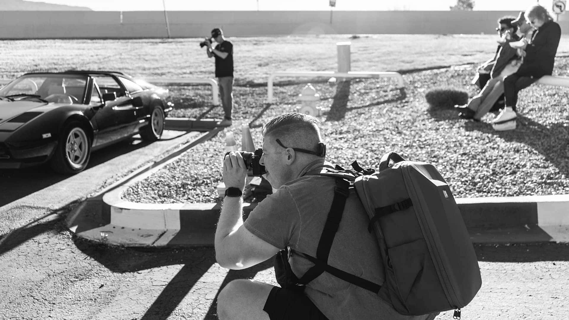 man taking a photograph