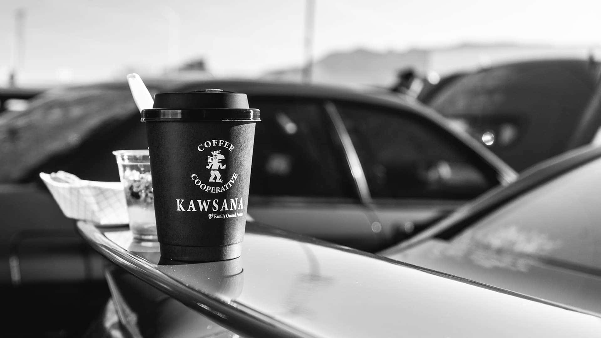 coffee cup on back of vehicle
