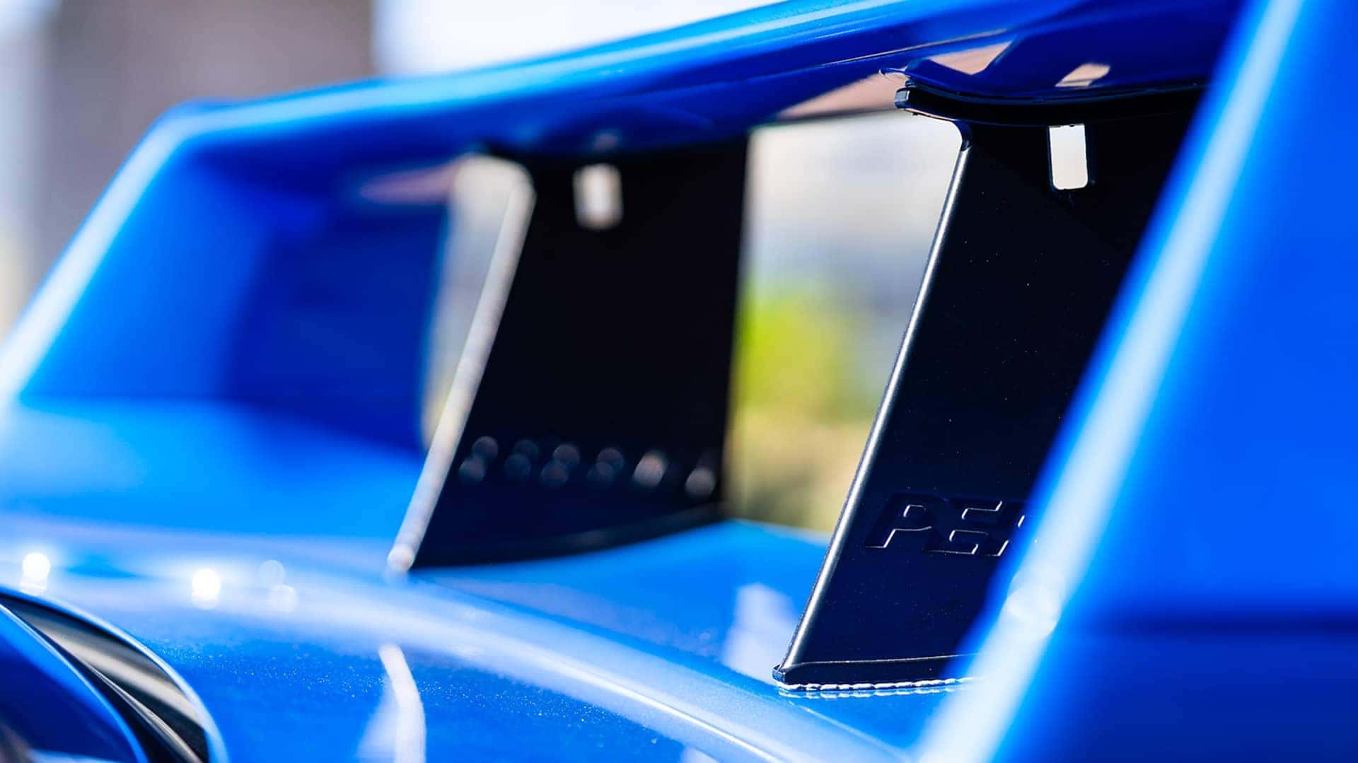 close up of blue car detail
