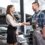 Customer woman and mechanic