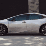 The profile of a parked 2026 Toyota Prius