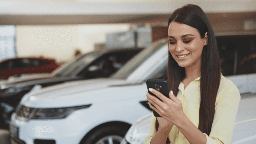 A women shopping for a car on her phone