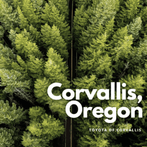 "Corvallis, Oregon Toyota of Corvallis" is written on top of a photograph of trees on top of it. 