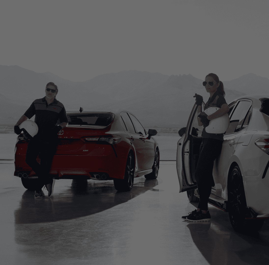 two people getting out of vehicles