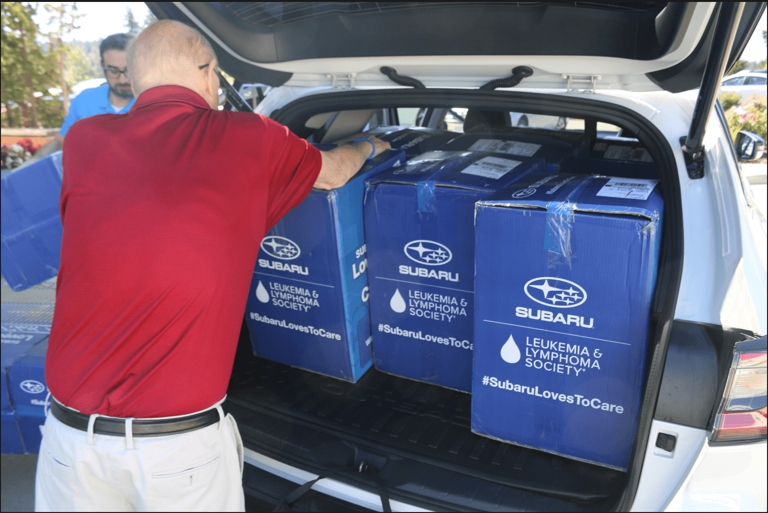 Richard Spence and Seth Breimen From Wilsonville Subaru deliver blankets to Providence cance institute in newberg oregon