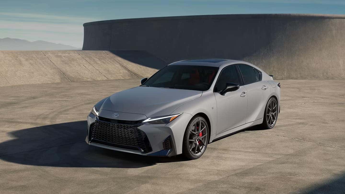 Gray 2026 Lexus IS 250 parked on a concrete background