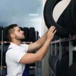 Technician installing new Lexus tires